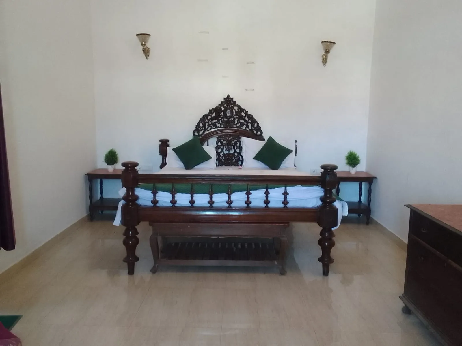Classic room decor at The Palace Homestay Junga near Shimla